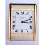 A CARTIER OF PARIS TWO TONE STRUT DESK CLOCK. 10 cm x 6.5 cm.