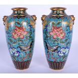 A PAIR OF 19TH CENTURY CHINESE CLOISONNE ENAMEL VASES Qing, decorated with foliage and butterflies.