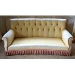 A GOOD QUALITY YELLOW GROUND UPHOLSTERED THREE SEATER SOFA. 190 cm x 90 cm. Note: This sofa matches