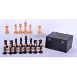 A BOXED JACQUES OF LONDON EBONY AND BOXWOOD CHESS SET. Largest 8.5 cm high. (qty)
