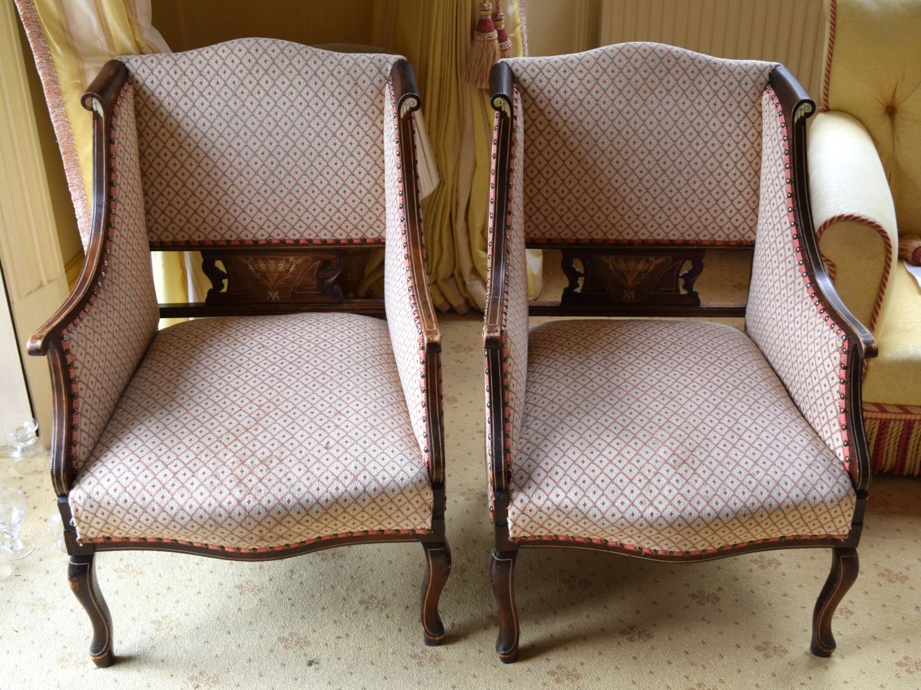 A PAIR OF 19TH CENTURY CONTINENTAL UPHOLSTERED SALON CHAIRS inlaid with foliage. 90 cm x 55 cm.