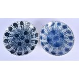 A PAIR OF LATE 17TH CENTURY CHINESE BLUE AND WHITE PORCELAIN SCALLOPED DISHES Kangxi/Yongzheng, pain