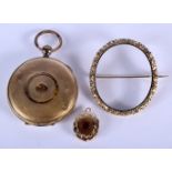 AN ANTIQUE YELLOW METAL IMITATION POCKET WATCH LOCKET together with two others. 44 grams overall. 4.