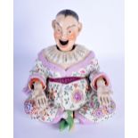 A 19TH CENTURY DRESDEN PORCELAIN NODDING FIGURE OF A CHINAMAN Meissen style, painted with flowers an