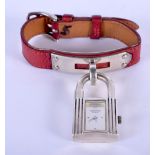 A VINTAGE HERMES OF PARIS SILVER PADLOCK BRACELET WATCH. Padlock 1.75 cm x 1 cm.