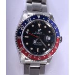 A GOOD ROLEX GMT MASTER PEPSI DIAL STAINLESS STEEL WRIST WATCH with black dial. 4 cm wide inc crown.