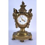 A LARGE 19TH CENTURY FRENCH BRONZE MANTEL CLOCK with grotesque mask head handles entwined with snake