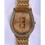 A GOLD INGOT WRISTWATCH. 3.5 cm x 3.75 cm.