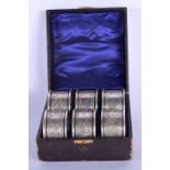SIX CASED SILVER NAPKIN RINGS. Chester 1903. 162 grams. 4.5 cm wide. (6)