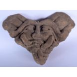 AN EARLY CARVED STONE AZTEC STYLE MASK HEAD. 26 cm x 16 cm.