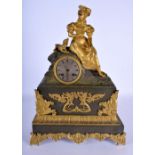 A 19TH CENTURY FRENCH BRONZE MANTEL CLOCK modelled as a female with hound. 38 cm x 24 cm.