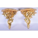 A PAIR OF GILTWOOD HANGING WALL BRACKETS possibly Italian. 37 cm x 26 cm.