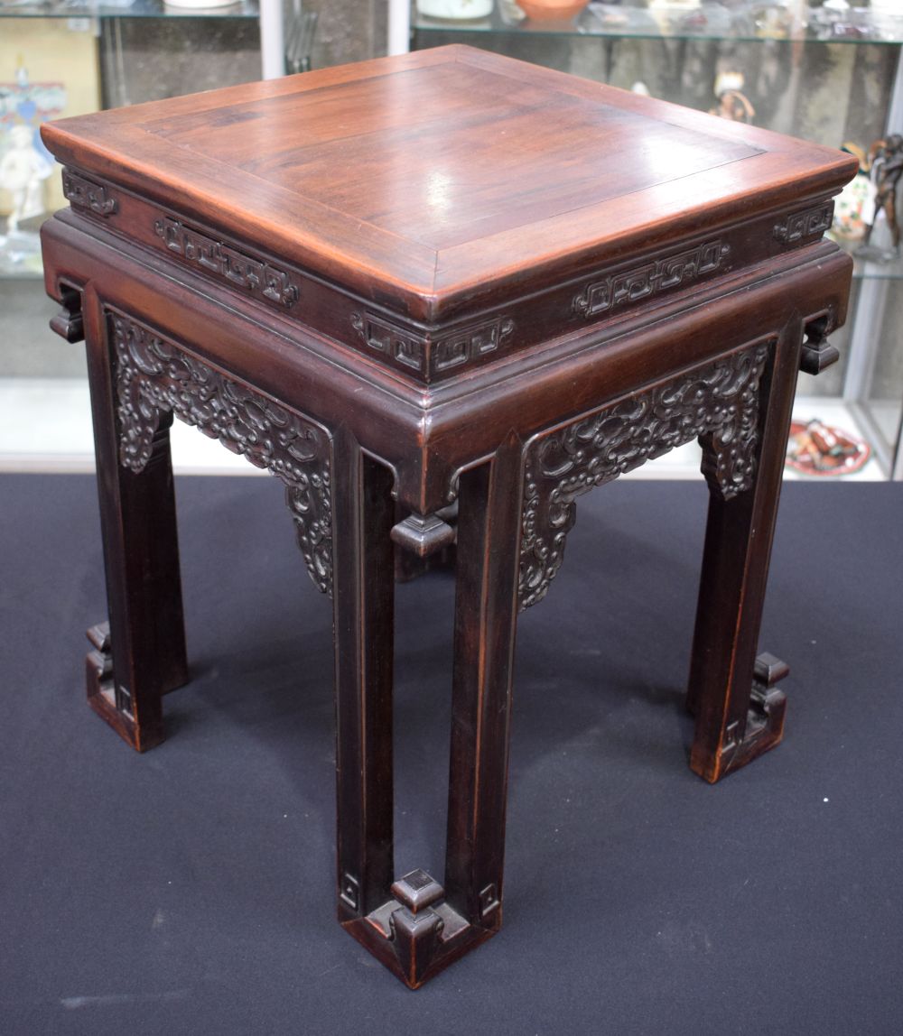 A FINE 19TH CENTURY CHINESE CARVED HONGMU SQUARE FORM STAND Qing, of unusual form with stylised beas - Image 2 of 18