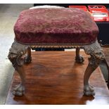 A 19TH CENTURY CONTINENTAL CARVED WOOD STOOL probably Southern European, carved with grotesque mask