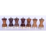 SEVEN 1980S SILVER MOUNTED PEPPER MILLS. London 1985 & 1986. 822 grams. 10 cm x 4.5 cm. (7)