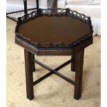 A GEORGE III STYLE CHIPPENDALE TYPE MAHOGANY TRAY ON STAND with inset glass top. 50 cm x 45 cm,