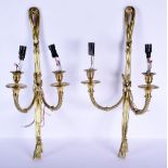 A PAIR OF LOUIS XV STYLE BRASS WALL LIGHTS. 56 cm x 14 cm.