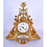 A 19TH CENTURY FRENCH GILT BRONZE AND SEVRES PORCELAIN MANTEL CLOCK painted with putti and bandings