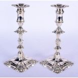 A MATCHED PAIR OF ENGLISH SILVER CANDLESTICKS. London 1898 & Birmingham 1902. 1238 grams (central we