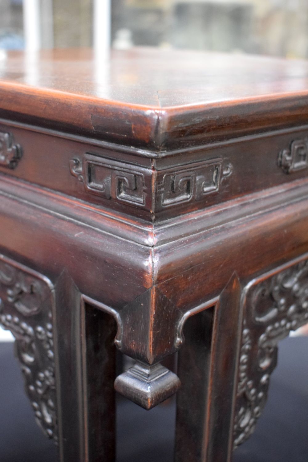 A FINE 19TH CENTURY CHINESE CARVED HONGMU SQUARE FORM STAND Qing, of unusual form with stylised beas - Image 5 of 18