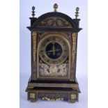 A RARE 18TH CENTURY CONTINENTAL EBONISED BOULLE TYPE INLAID BRACKET CLOCK with matching bracket, the