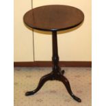 A GEORGE III MAHOGANY TABLE with circular top. 70 cm x 30 cm.