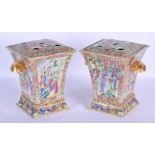 A FINE PAIR OF 19TH CENTURY CHINESE CANTON FAMILLE ROSE BOUGH POTS AND COVERS Qing, painted with fig