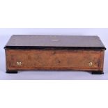 AN ANTIQUE SWISS BURR WALNUT EIGHT AIR MUSICAL BOX. 50 cm x 20 cm, cylinder 32 cm wide.