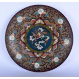 A 19TH CENTURY JAPANESE MEIJI PERIOD CLOISONNE ENAMEL DISH decorated with birds. 28 cm diameter.