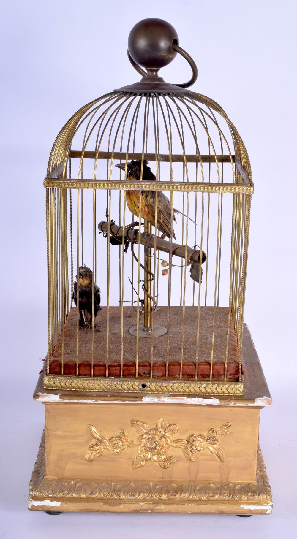 A MID 19TH CENTURY EUROPEAN CARVED GILTWOOD AUTOMATON SINGING BIRD CAGE embellished with flowers and