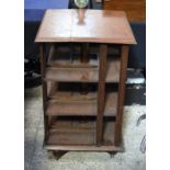 AN EARLY 20TH CENTURY WARING & GILLOWS REVOLVING BOOKCASE. 90 cm x 52 cm.