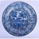 AN EARLY 20TH CENTURY CONTINENTAL BLUE AND WHITE PORCELAIN PLATE decorated with foliage. 21 cm diame