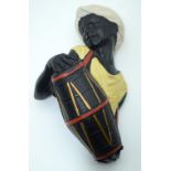 A painted hanging of a plaster black a moor figure 25cm