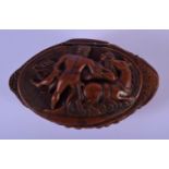 AN 18TH CENTURY EUROPEAN CARVED COQUILLA NUT SNUFF BOX AND COVER modelled as a nude male and female