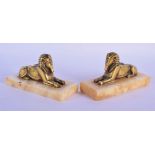 A PAIR OF EARLY 20TH CENTURY EUROPEAN GRAND TOUR BRONZE FIGURES OF SPHINXES. 12 cm x 8 cm.