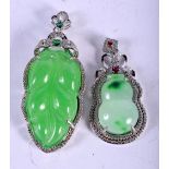 TWO CHINESE JADE PENDANTS 20th Century. 27 grams. Largest 6 cm x 3 cm.