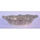 AN ANTIQUE CONTINENTAL WHITE METAL DISH decorated with foliage. 5.5 cm x 21 cm.