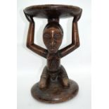 An African tribal wooden stool. 43 x 28cm