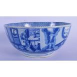 A 17TH CENTURY CHINESE BLUE AND WHITE PORCELAIN BOWL bearing Kangxi marks to base, painted with figu