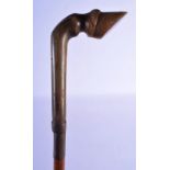 A 19TH CENTURY CONTINENTAL CARVED RHINOCEROS HORN HOOF FOOT WALKING CANE. 90 cm long.