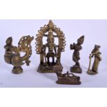 FIVE 19TH CENTURY INDIAN BRONZE BUDDHISTIC DEITIES modelled in various forms and sizes. Largest 11 c