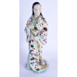 A 19TH CENTURY JAPANESE MEIJI PERIOD AO KUTANI PORCELAIN FIGURE OF A FEMALE painted with motifs. 24