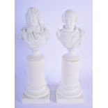 A PAIR OF LATE 19TH CENTURY PARIAN WARE PORCELAIN BISQUE BUSTS modelled upon pedestal columns. 24 cm