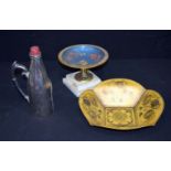 A lacquered Taza on a plinth together with a plated wine pourer and a metal bowl 28cm.(3).