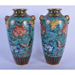 A PAIR OF 19TH CENTURY CHINESE CLOISONNE ENAMEL VASES Qing, decorated with foliage and butterflies.