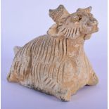 AN ANCIENT CHINESE YUAN MONGOLIAN EARTHENWARE ANIMAL representing a zodiac sign. 12 cm x 10 cm.