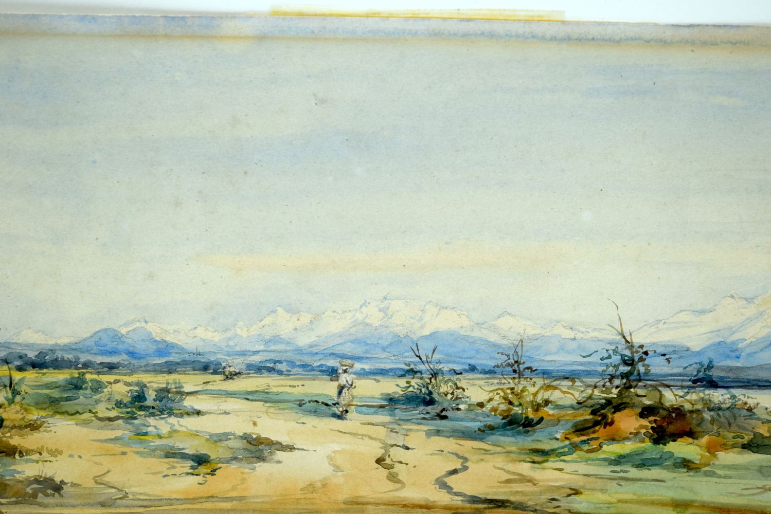 A small 19th century watercolour of a figure in a mountainous land scape .17 x 33cm. - Bild 2 aus 3