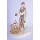 AN 18TH CENTURY CONTINENTAL PORCELAIN FIGURE OF A FEMALE HOLDING A BIRDS NEST modelled upon a shaped