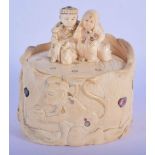 A 19TH CENTURY JAPANESE MEIJI PERIOD CARVED SHIBAYAMA IVORY VASE AND COVER decorated with Buddhistic