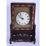 A 19TH CENTURY CHINESE HONGMU MOTHER OF PEARL INLAID MANTEL CLOCK with repousse dial decorated with